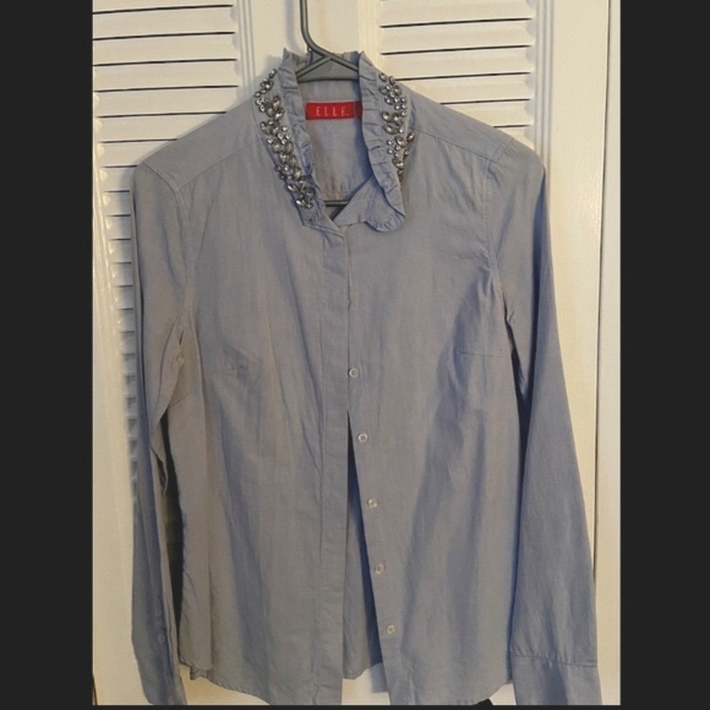Blue jeweled blouse